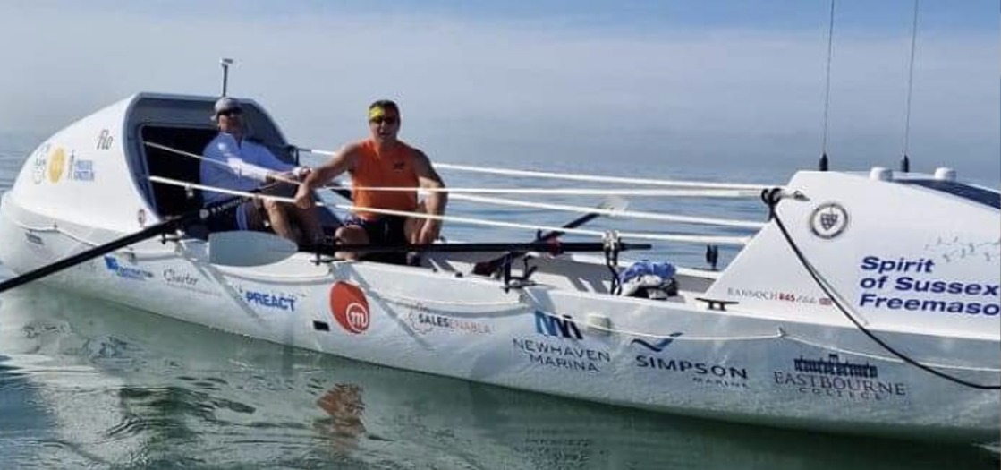 The rowers on their boat